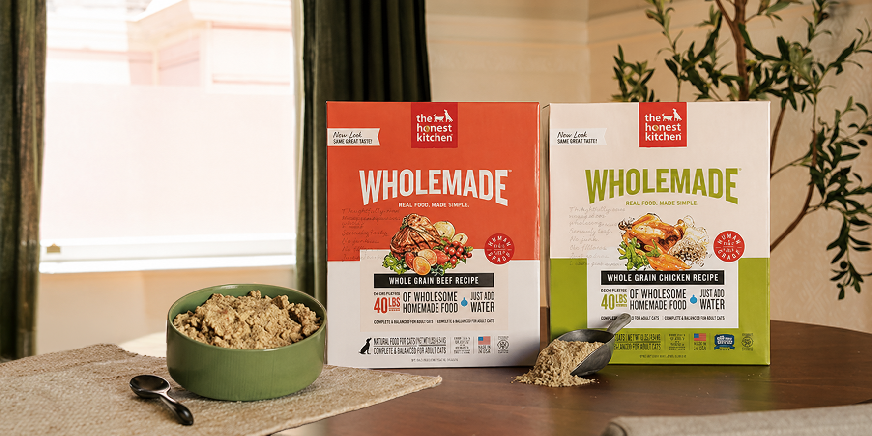 Two bags of wholemade The Honest Kitchen dog food sitting on a kitchen counter