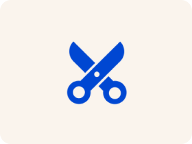 Blue Icon of a pair of scissors, representing pet grooming services.