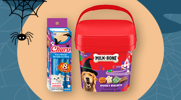 Shows a selection of Halloween-themed pet treats, including Temptations "Tasty Human" treats, Blue boo-treats, and Claudia's halloween treat pops.