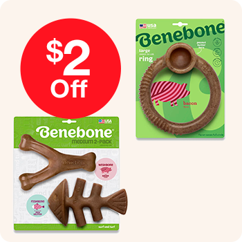 Two packages of dog toys with a $2 discount tag displayed prominently on the packaging.