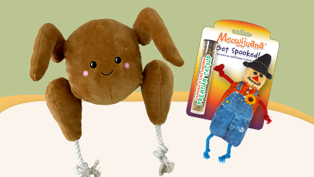 Fall-themed dog toys, including a plush turkey and catnip scarecrow