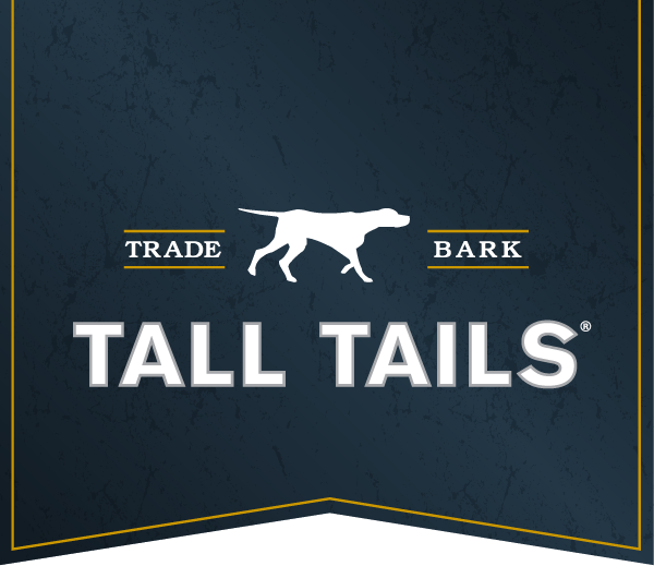 Tall Tails logo with white dog icon