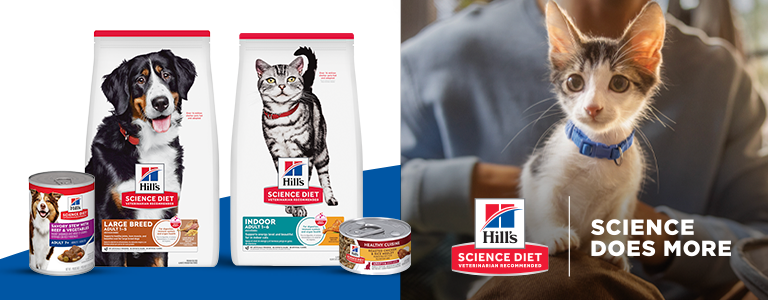 Hill's science diet food two bags and two cans plus a cat in a persons arms "Science Does More" 